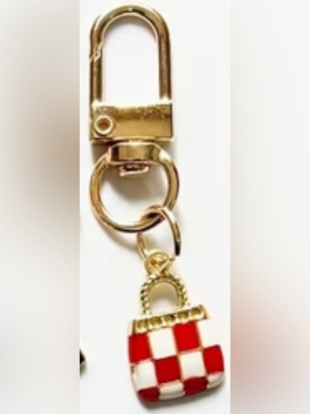 Keychain Featuring a Red an White Checkered Handbag Charm with Gold Accents.